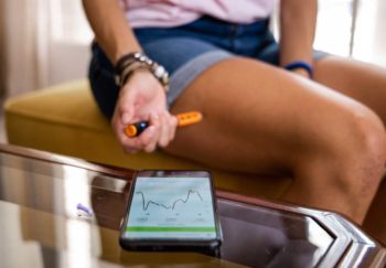 woman injects insulin